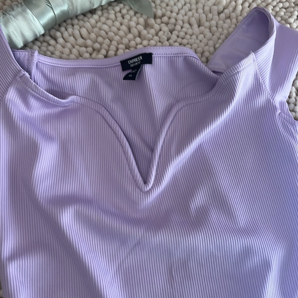 Express women’s extra small bodysuit. Never worn.